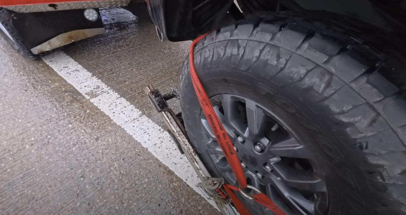 Close-up of secure tow straps and equipment for motorcycle towing in Gilroy, CA